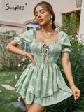 Drespot Hollow Out Print Lace Up Green Women Romper Summer Backless Short Sleeves Ruffle Rompers Square Collar Elastic Overall